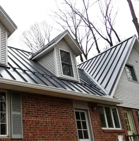 Metal roofing fitted around dormers