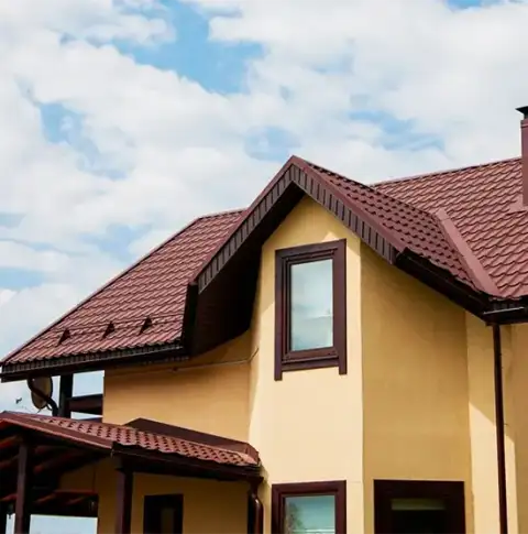 Metal roofing on a brick house